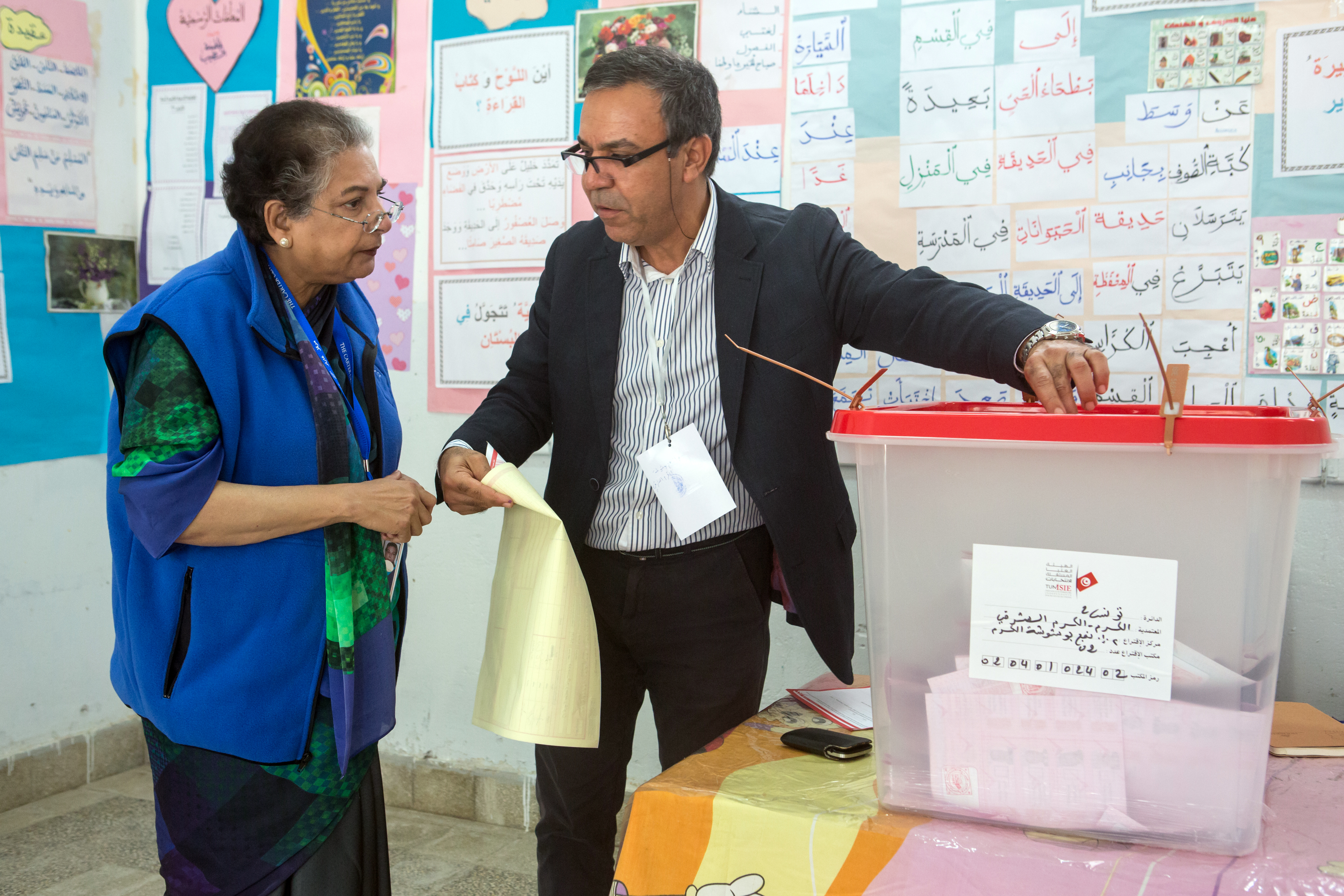 Center Center co-leader Hina Jilani, an international human rights leader from Pakistan, observes at a polling station in greater Tunis. Center observers visited more than 300 polling stations throughout Tunis to assess whether electoral procedures were followed and how well elections were administered on election day. The Center's findings will be released Tuesday, Nov. 25.